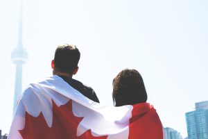 Couple with flag in Toronto